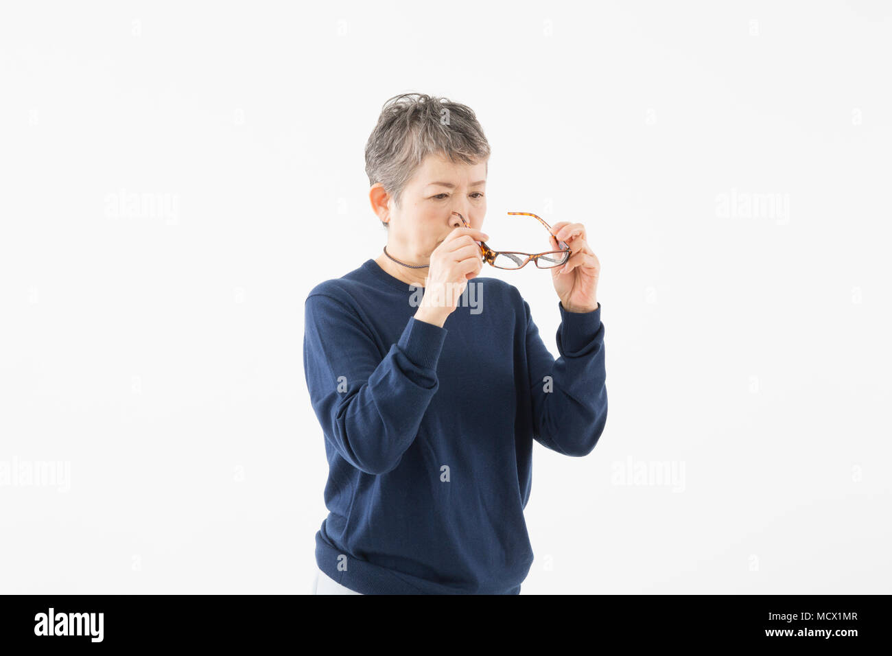 Image of presbyopia (Senior woman) Stock Photo