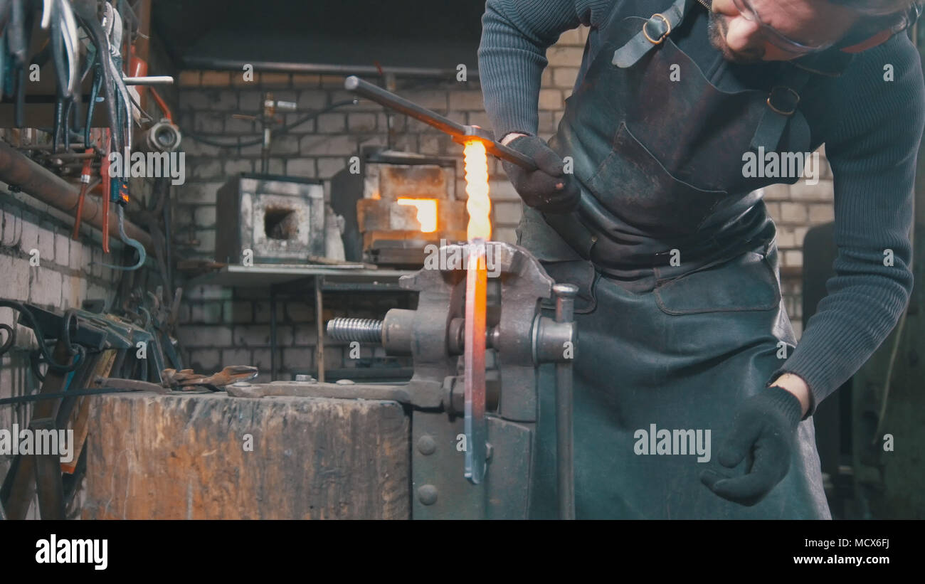Craftsman shaping molten steel hi-res stock photography and images - Alamy