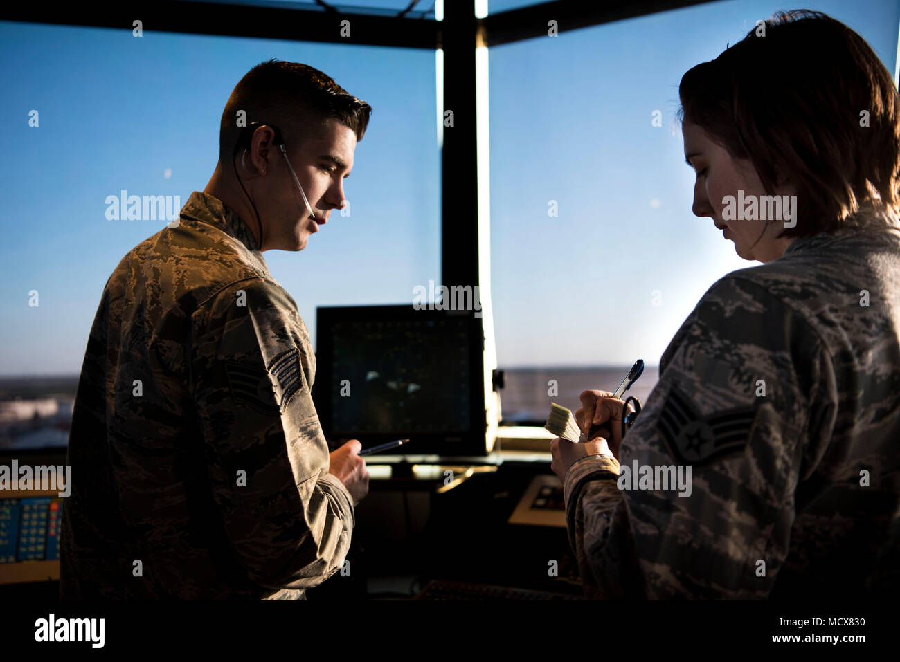 Vance air traffic controllers manage the airspace from Inhofe Air Traffic Control Tower, March 1, 2017, at Vance Air Force Base, Okla. Although Vance may be known as a pilot training base, it's also one of the leaders in training and certifying Air Force air traffic controllers. (U.S. Air Force photo by Airman Zachary Heal) Stock Photo