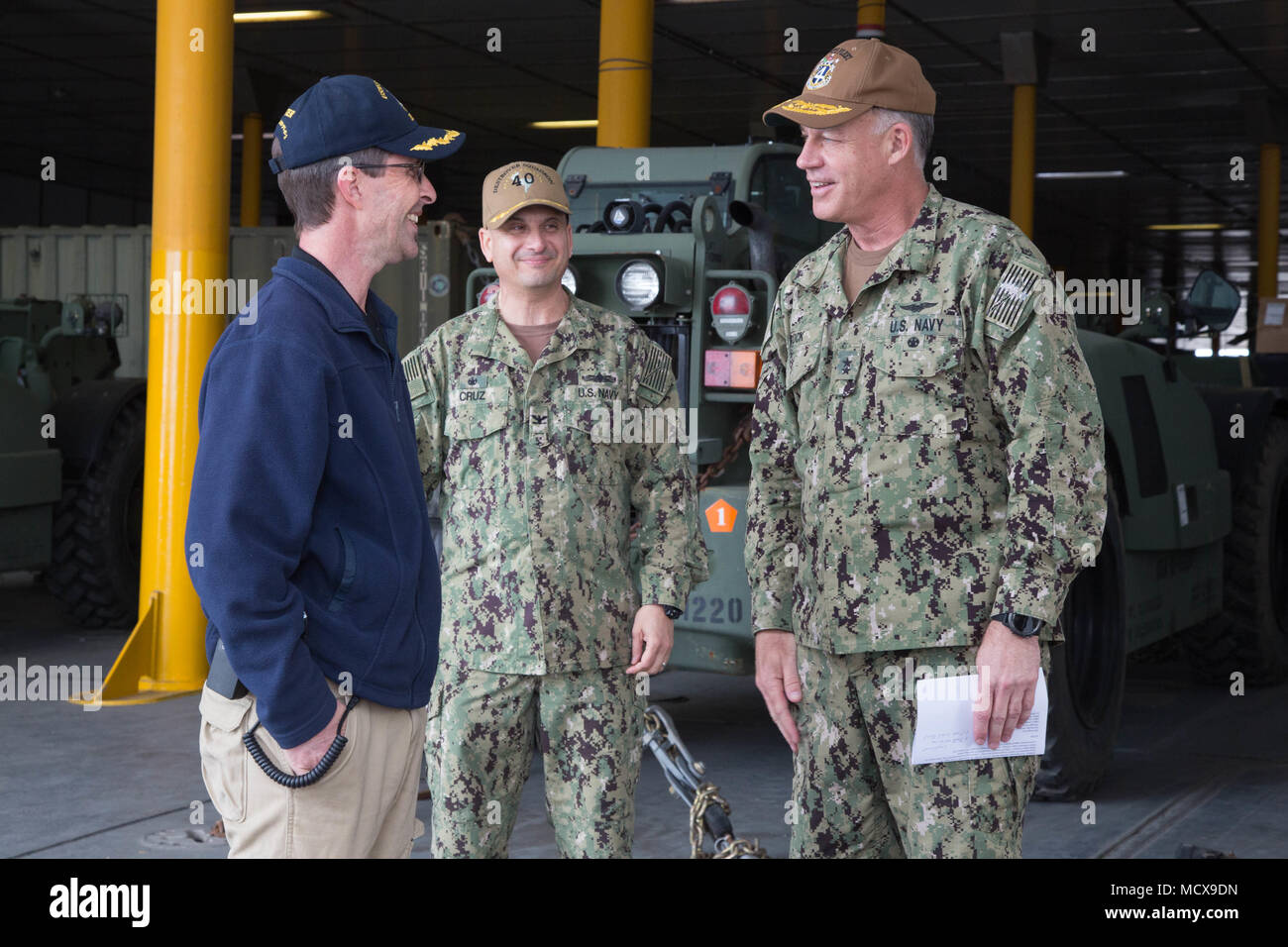 180305-A-WO440-0026 MAYPORT, Fla. (March 5, 2018) Capt. Douglas Casavant, Master of the USNS Spearhead, from Chesapeake, Virginia, and Capt. Angel Cruz, Commodore of Destroyer Squadron (DESRON) 40, greet Rear Admiral Sean Buck, Commander, U.S. Naval Forces Southern Command/U.S. 4th Fleet, aboard the expeditionary fast transport vessel USNS Spearhead (T-EPF 1). U.S. Naval Forces Southern Command/U.S. 4th Fleet has deployed a force to execute Continuing Promise to conduct civil-military operations including humanitarian assistance, training engagments, and medical, dental, and veterinary support Stock Photo