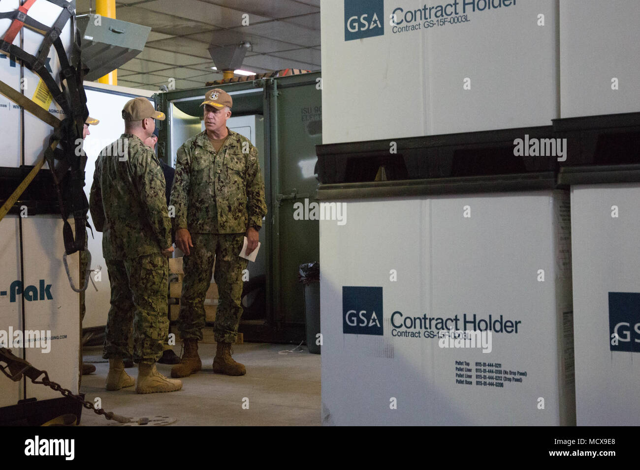 180305-A-WO440-0046 MAYPORT, Fla. (March 5, 2018) Rear Admiral Sean Buck, Commander, U.S. Naval Forces Southern Command/U.S. 4th Fleet, speaks with Capt. Angel Cruz, Commodore of Destroyer Squadron (DESRON) 40, from Miami, Florida, aboard the expeditionary fast transport vessel USNS Spearhead (T-EPF 1). U.S. Naval Forces Southern Command/U.S. 4th Fleet has deployed a force to execute Continuing Promise to conduct civil-military operations including humanitarian assistance, training engagements, and medical, dental, and veterinary support in an effort to show U.S. support and commitment to Cent Stock Photo