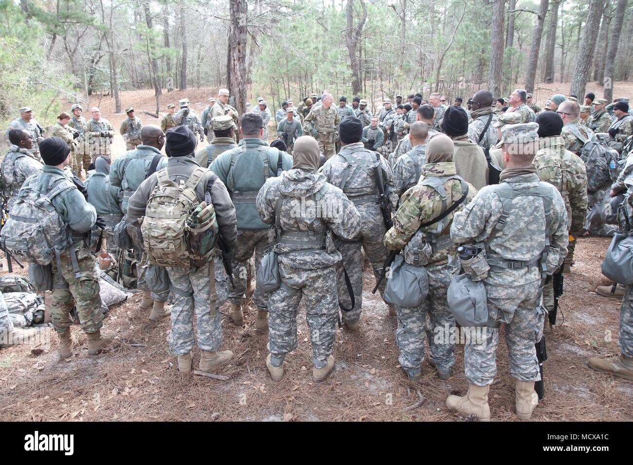 U.S. Army Reserve Soldiers part of Ready Force X units gather around