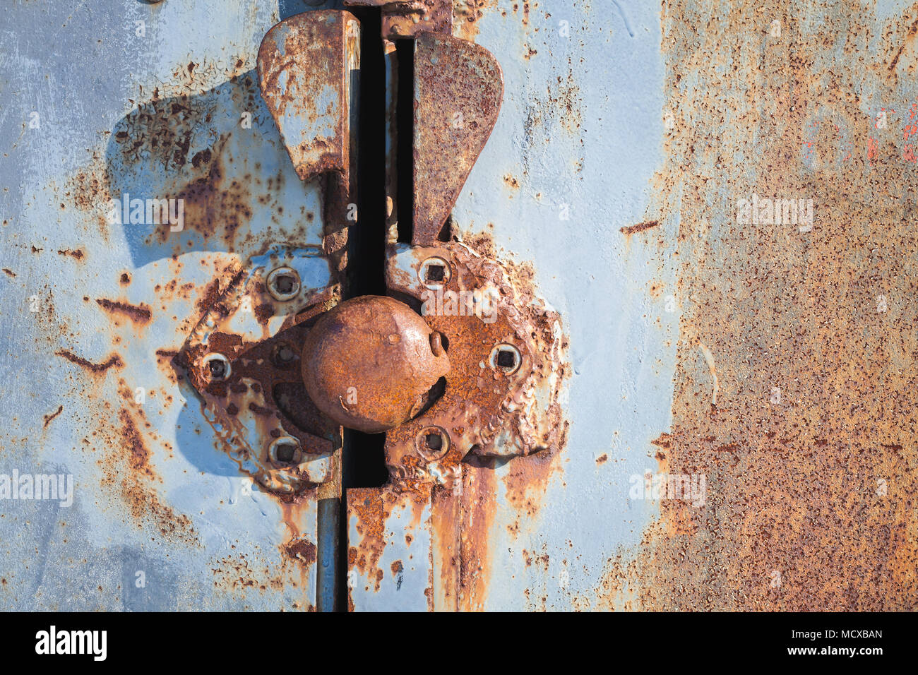 Old rusted lock in grungy metal door. Close up photo Stock Photo Alamy