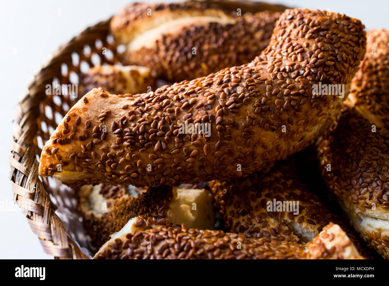 Turkish Bagel Simit with Sesame in wooden basket. Bakery Concept Stock ...