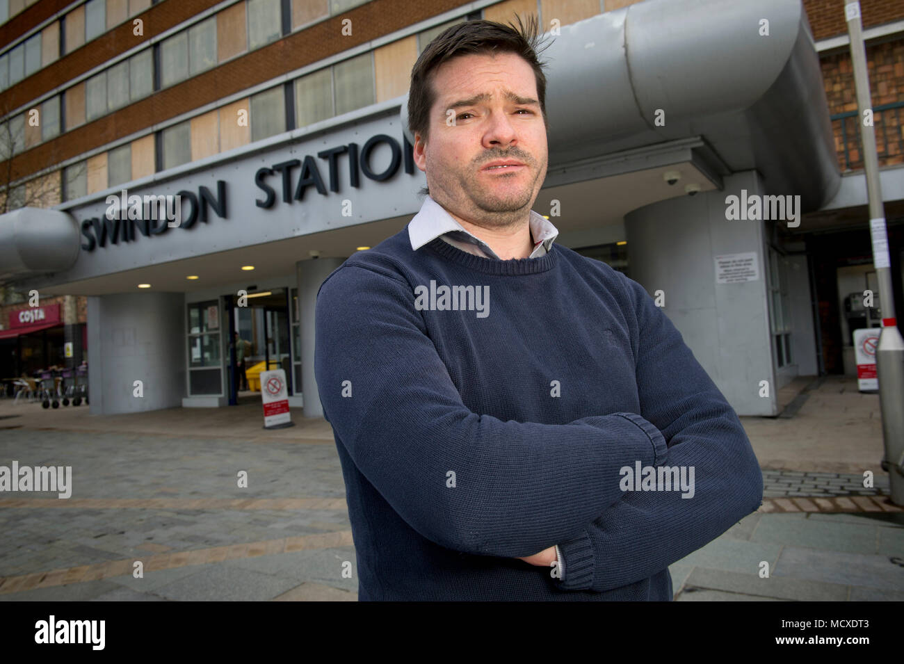 Martin Costello, UKIP candidate in Swindon, Wiltshire, photographed in front of Swindon station and the site of the new art gallery. Stock Photo
