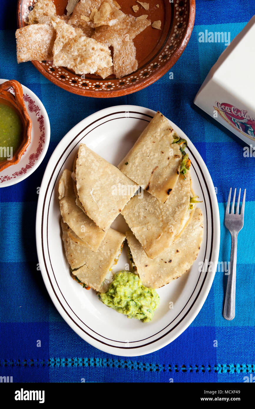 Quesadilla with guacamole and chicharron chips Mexico City, Mexico