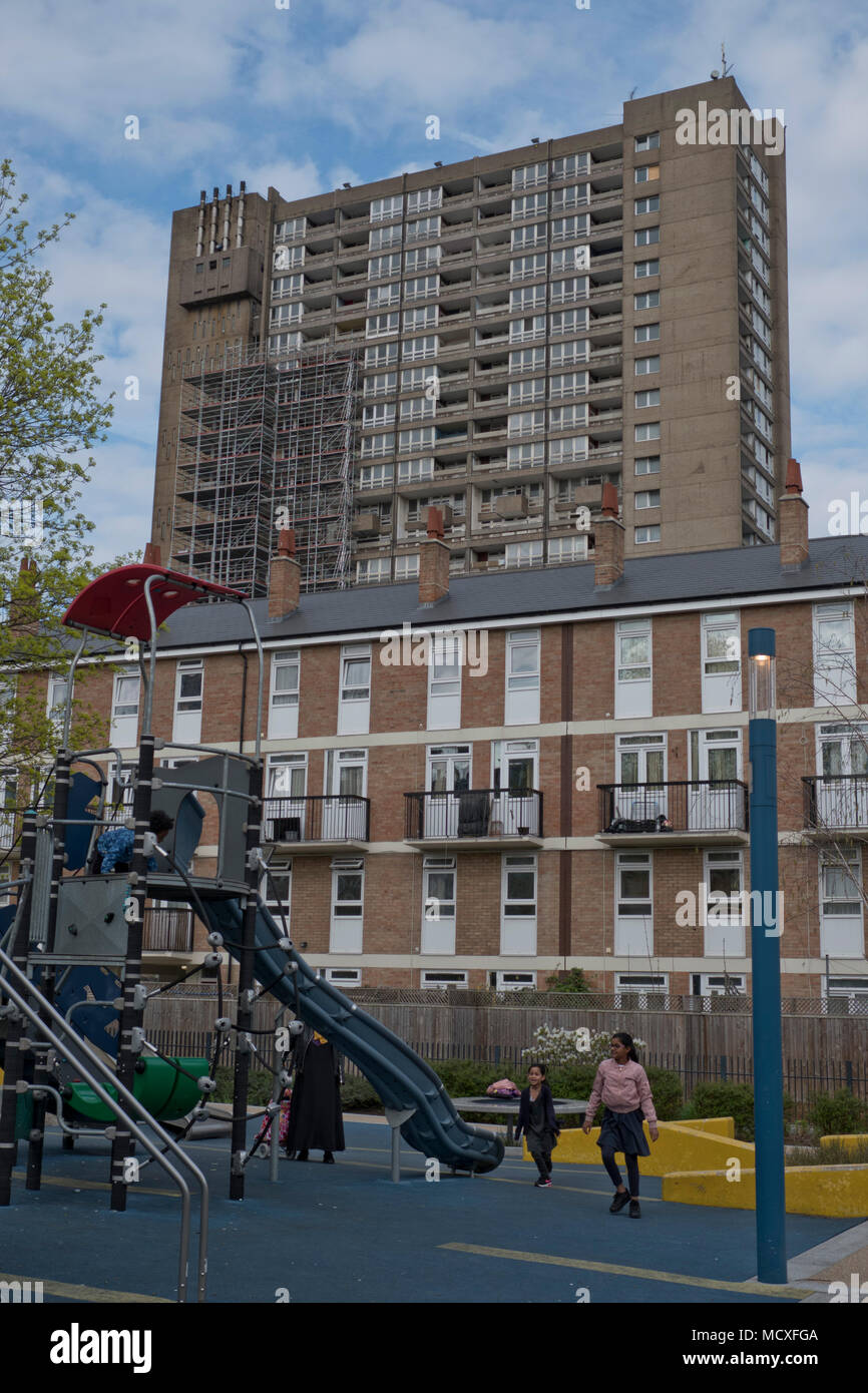 children-play-in-playground-with-a-view-of-the-26-storey-balfron-tower