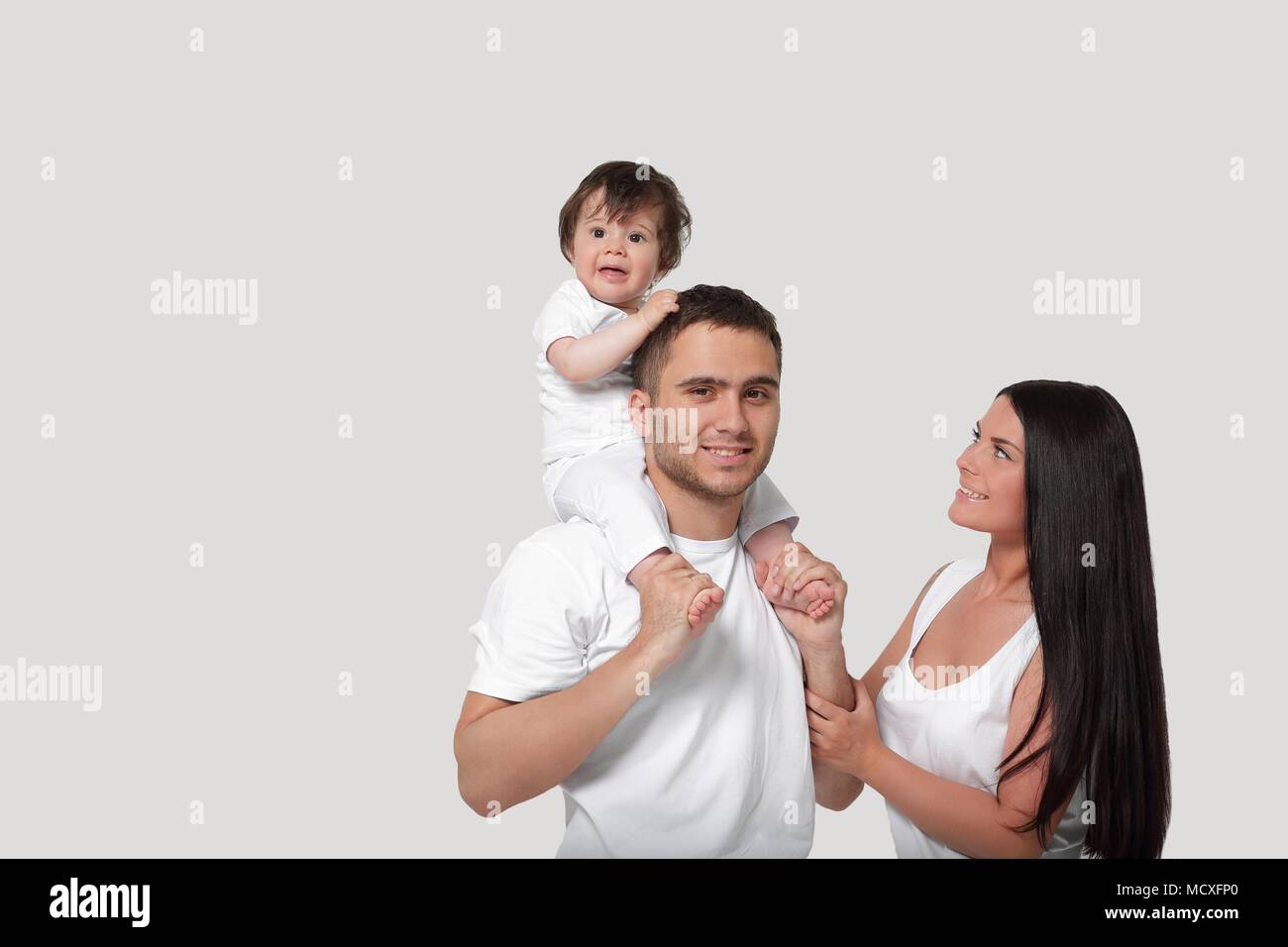 A happy family on white background Stock Photo - Alamy