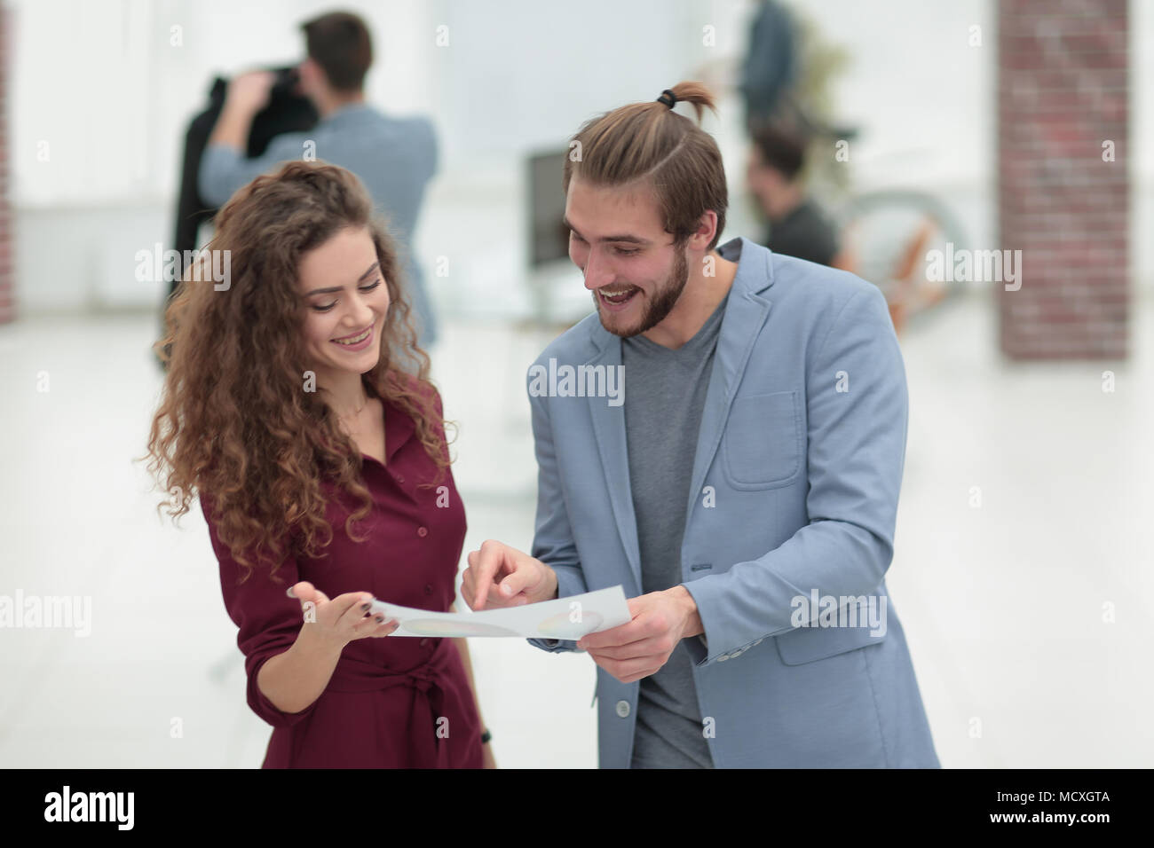 two designers discussing a new project. Stock Photo