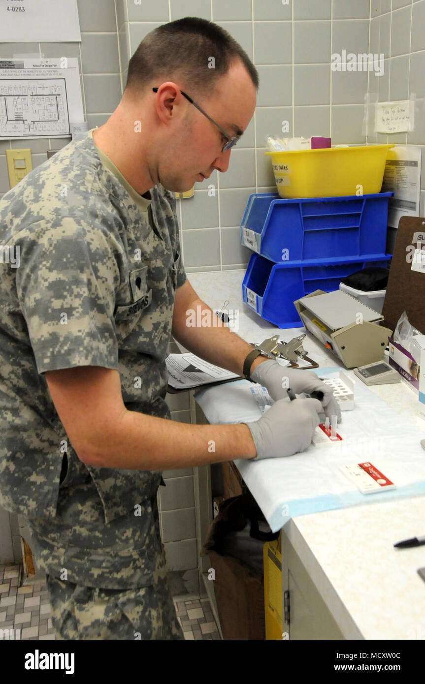Spc. Travis Stevens, a medical laboratory specialist assigned to 7417th