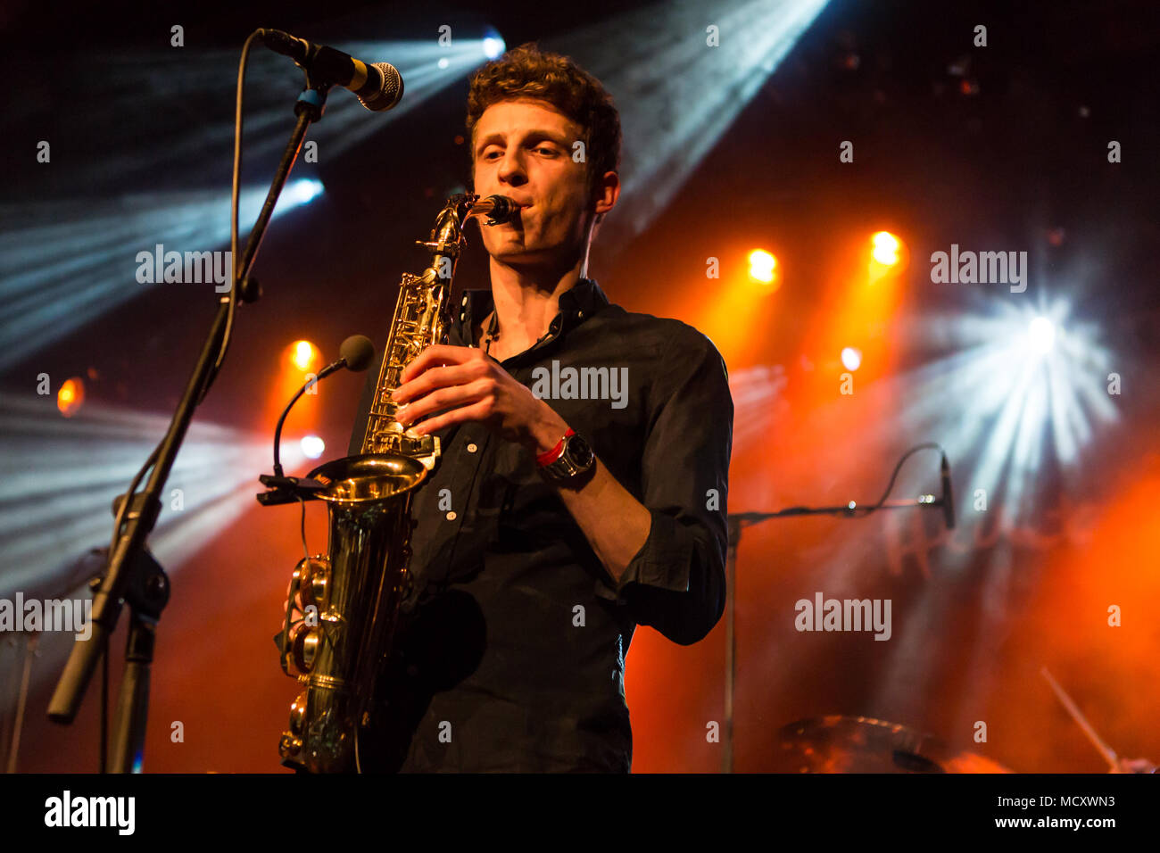 Rafael Rudin, saxophonist of the Swiss dialect band Les Touristes live in  the Schüür Lucerne, Switzerland Stock Photo - Alamy