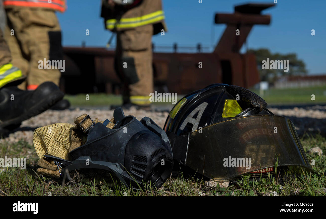 Shreveport Fire Department equipment lies on the ground before the start of an annual recertification burn at Barksdale Air Force Base, La., March 21, 2018. Sixty SFD firefighters were able to circulate through the three-day exercise. Stock Photo