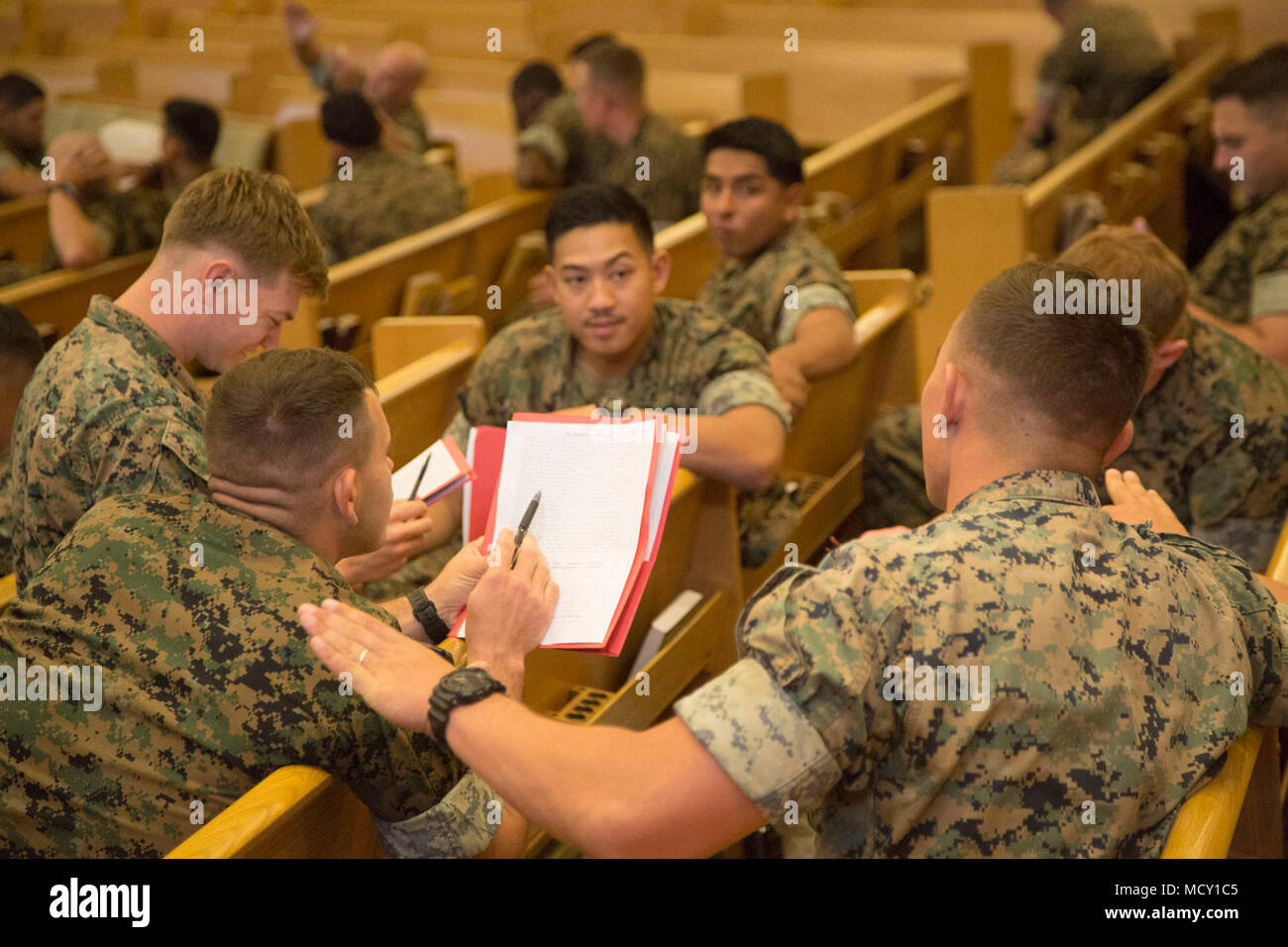 U.S. Marines with 2nd Battalion, 3d Marine Regiment discuss negotiation