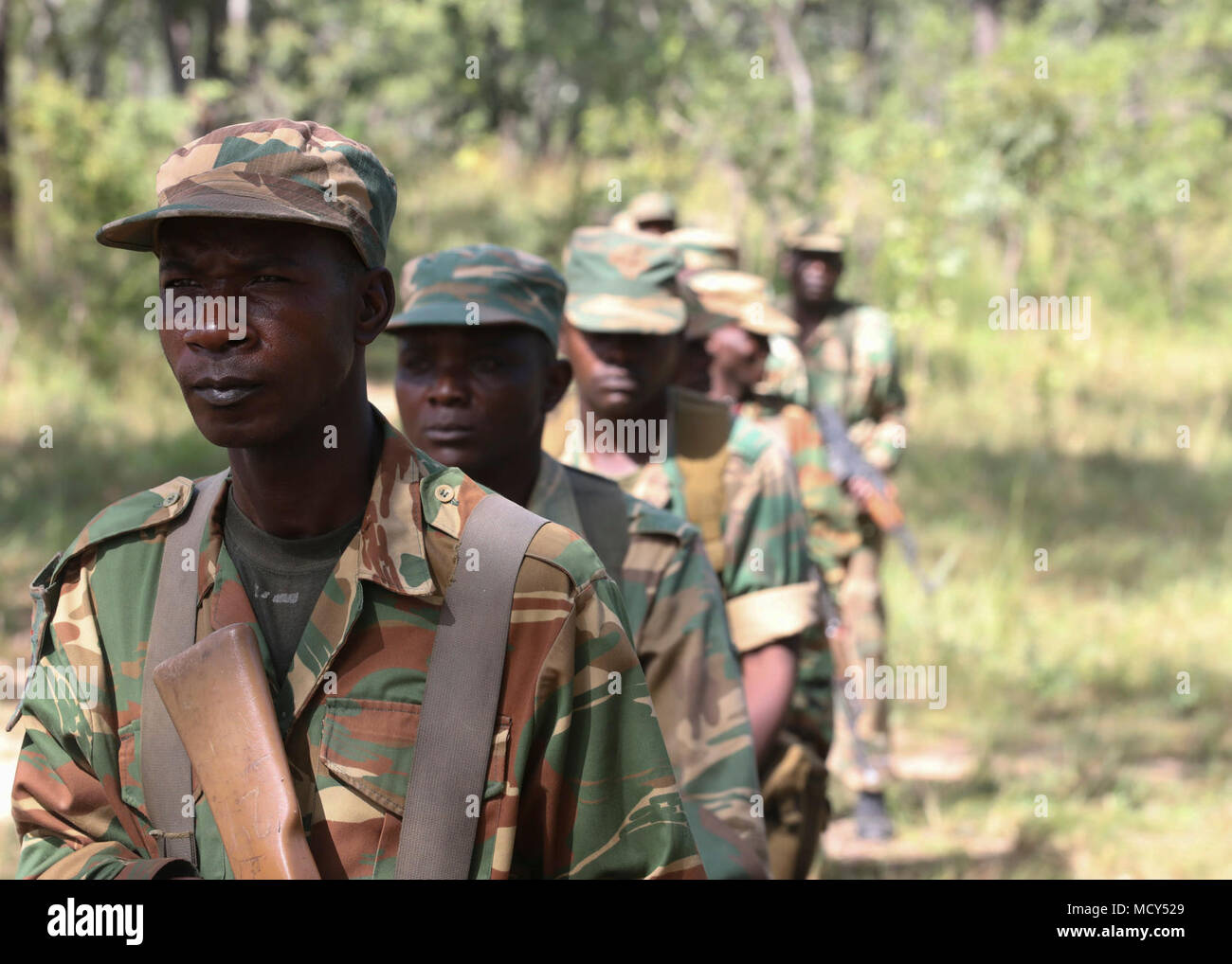 Zambian soldiers practice squad movements while training during ZAMBAT