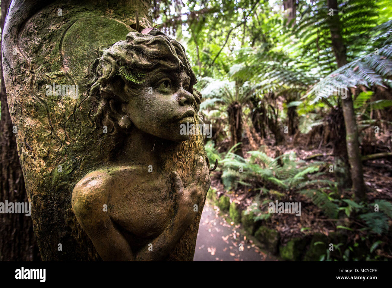 Figurine in forest of Dandenong mountain ranges of Melbourne Australia William Ricketts Australasia Stock Photo