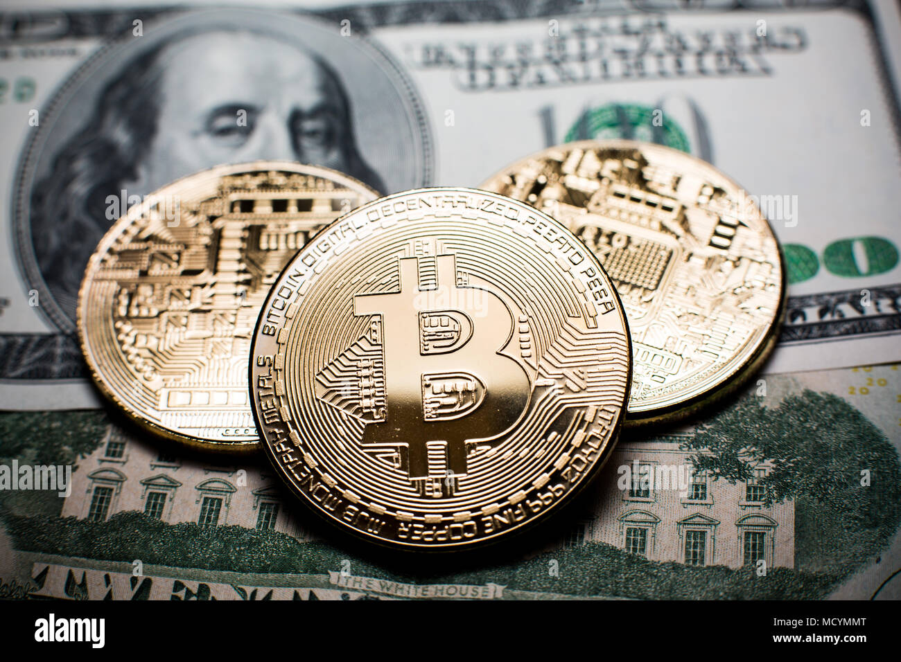 One gold coin bitcoin on a black background. Bitcoin is on its side. One  can see his reflection. Cryptocurrency concept gold bitcoin. No people,  empty Stock Photo - Alamy