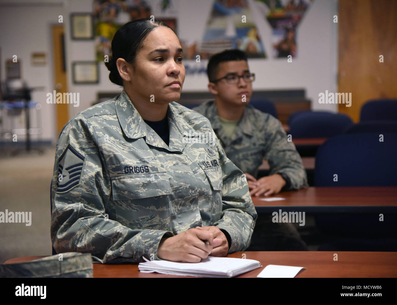 Master Sgt. Dennise Griggs, 81st Diagnostic and Therapeutics Squadron histopathology NCO in charge, and Airman 1st Class Nathaniel Gomez, 81st Dental Squadron dental technician, attend a “TSP Lunch N’ Learn with Liza” financial savings class at the Sablich Center March 2, 2018, on Keesler Air Force Base, Mississippi. The session was one of three held during military saves week. (U.S. Air Force photo by Kemberly Groue) Stock Photo