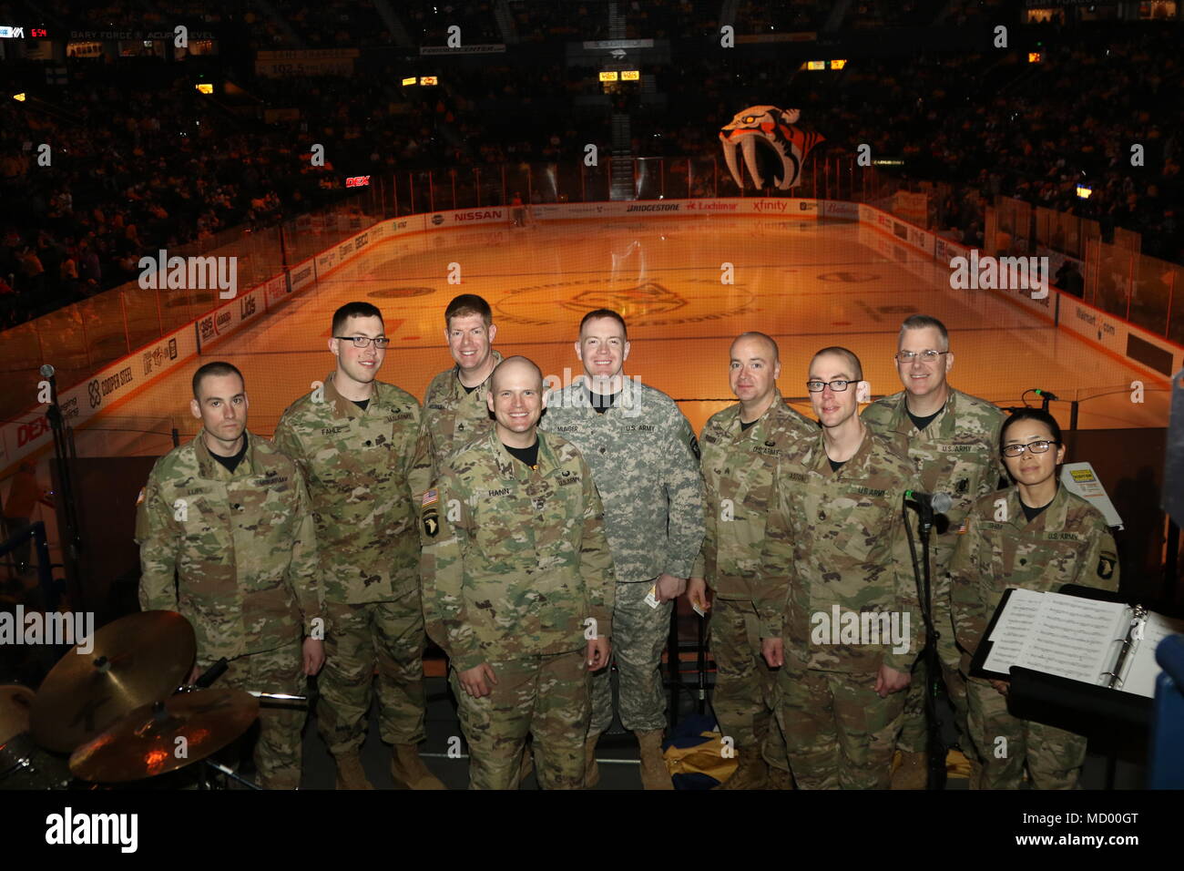 Members of the 101st Airborne Division Brass Band pose for a photo just