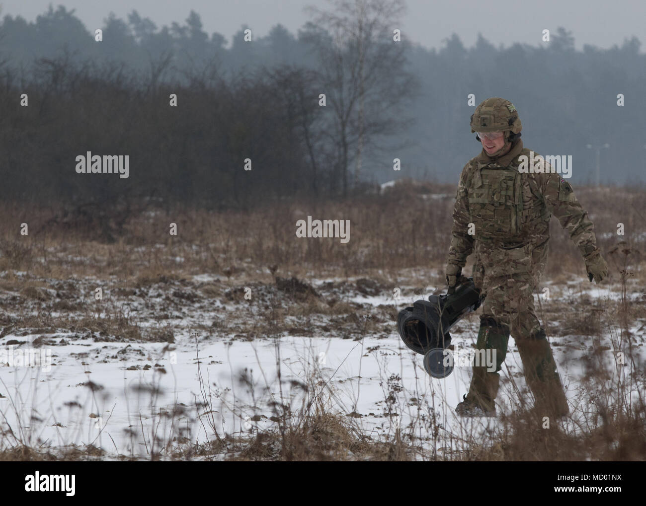 A British soldier assigned to the Light Dragoons brings an 