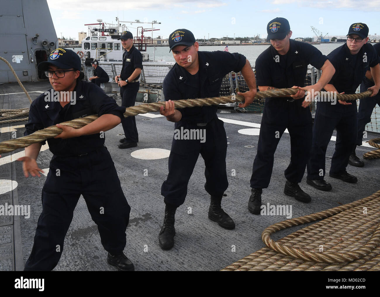 180309-N-FN963-0080 GUAM (March 09, 2018) Sailors heave a line on the ...