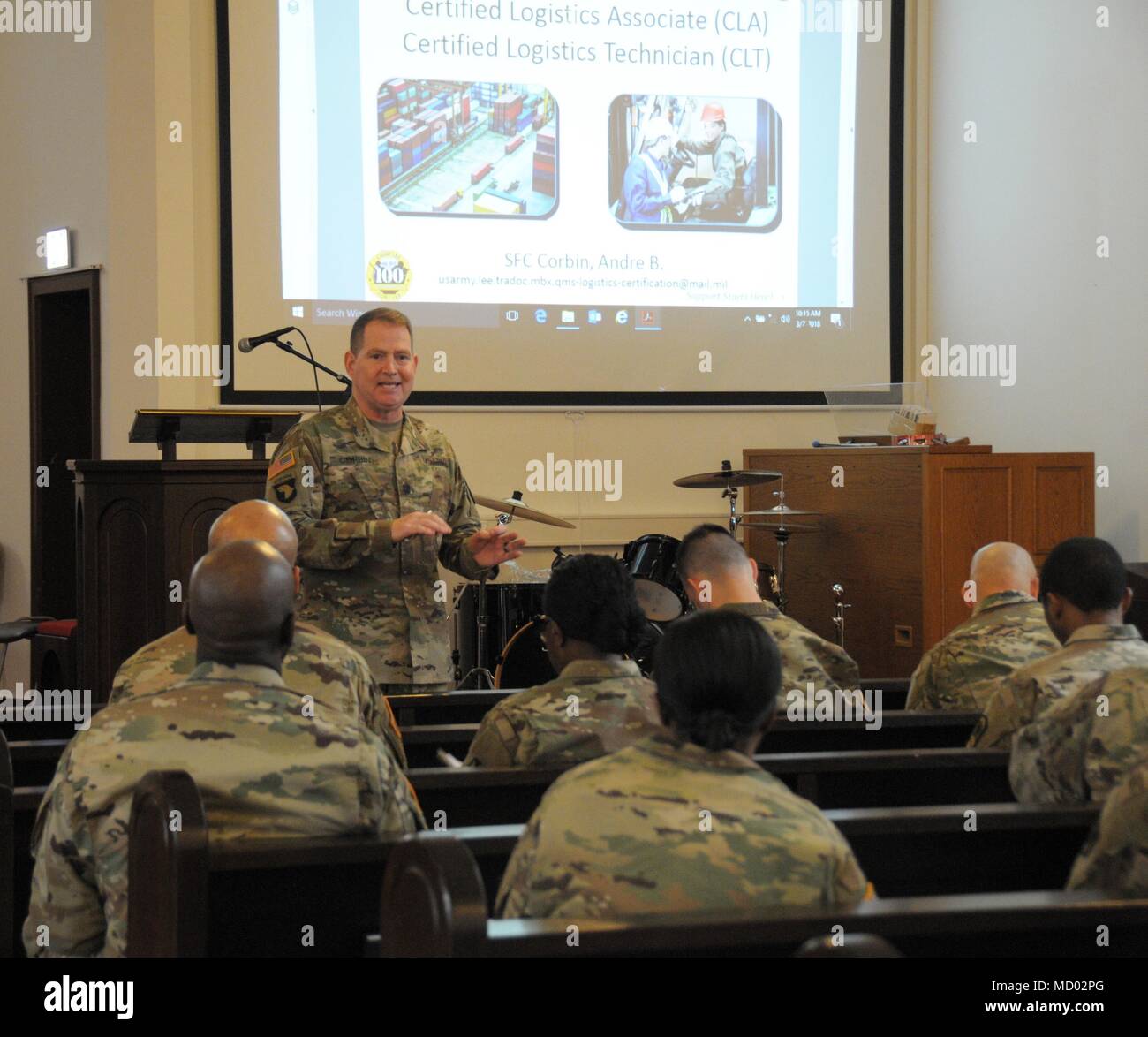 Sgt. 1st Class Andre Corbin, Logistics Training Department Credentialing non-commissioned officer-in-charge, discusses supply chain management credentialing opportunities available to 21st Theater Sustainment Command logisticians, March 6-7, at Daenner Kaserne chapel. Stock Photo