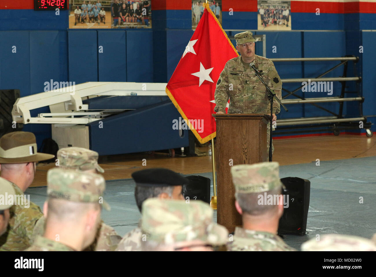 CAMP ARIFJAN, Kuwait – Maj. Gen. Andrew Schafer, 28th Infantry Division commanding general, addresses an audience that included leaders from Task Force Spartan partner nations during a transfer of authority ceremony March 8, 2018. The Pennsylvania Army National Guard unit’s headquarters and headquarters battalion assumed responsibility from its counterpart, the 35th Infantry Division which is comprised of soldiers from the Missouri and Kansas National Guard. The 28th’s HHBN will serve as a division headquarters for roughly 10,000 soldiers conducting theater security operations in the Middle Ea Stock Photo