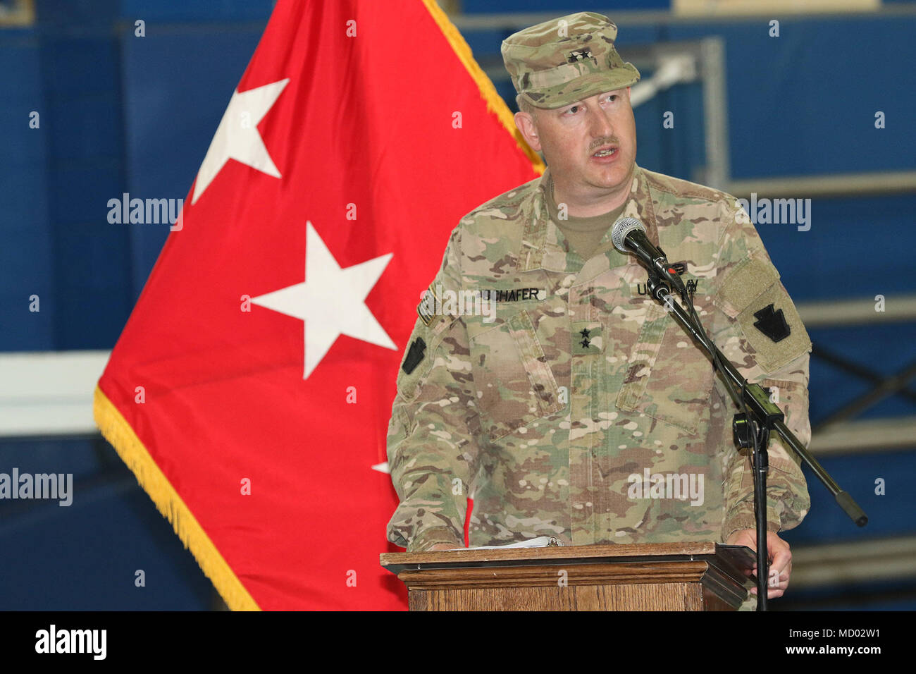 CAMP ARIFJAN, Kuwait – Maj. Gen. Andrew Schafer, 28th Infantry Division commanding general, explains the division’s role in Task Force Spartan during a transfer of authority ceremony March 8, 2018. The Pennsylvania Army National Guard unit’s headquarters and headquarters battalion assumed responsibility from its counterpart, the 35th Infantry Division which is comprised of soldiers from the Missouri and Kansas National Guard. The 28th’s HHBN will serve as a division headquarters for roughly 10,000 soldiers conducting theater security operations in the Middle East. (U.S. Army photo by Sgt. 1st  Stock Photo