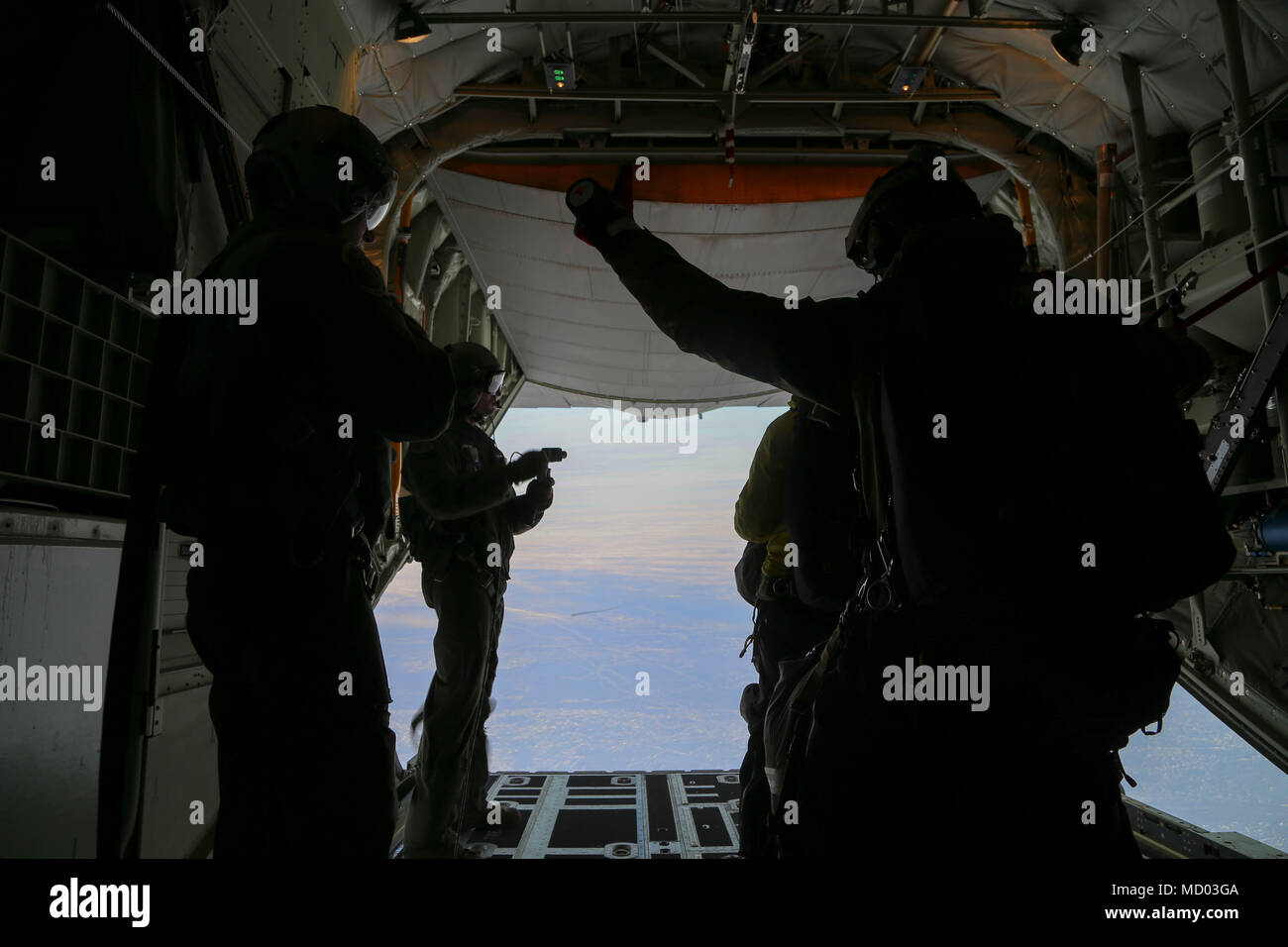 211 Rqs Alaska Air National Guardsmen with the 212th Rescue Squadron parachute ...