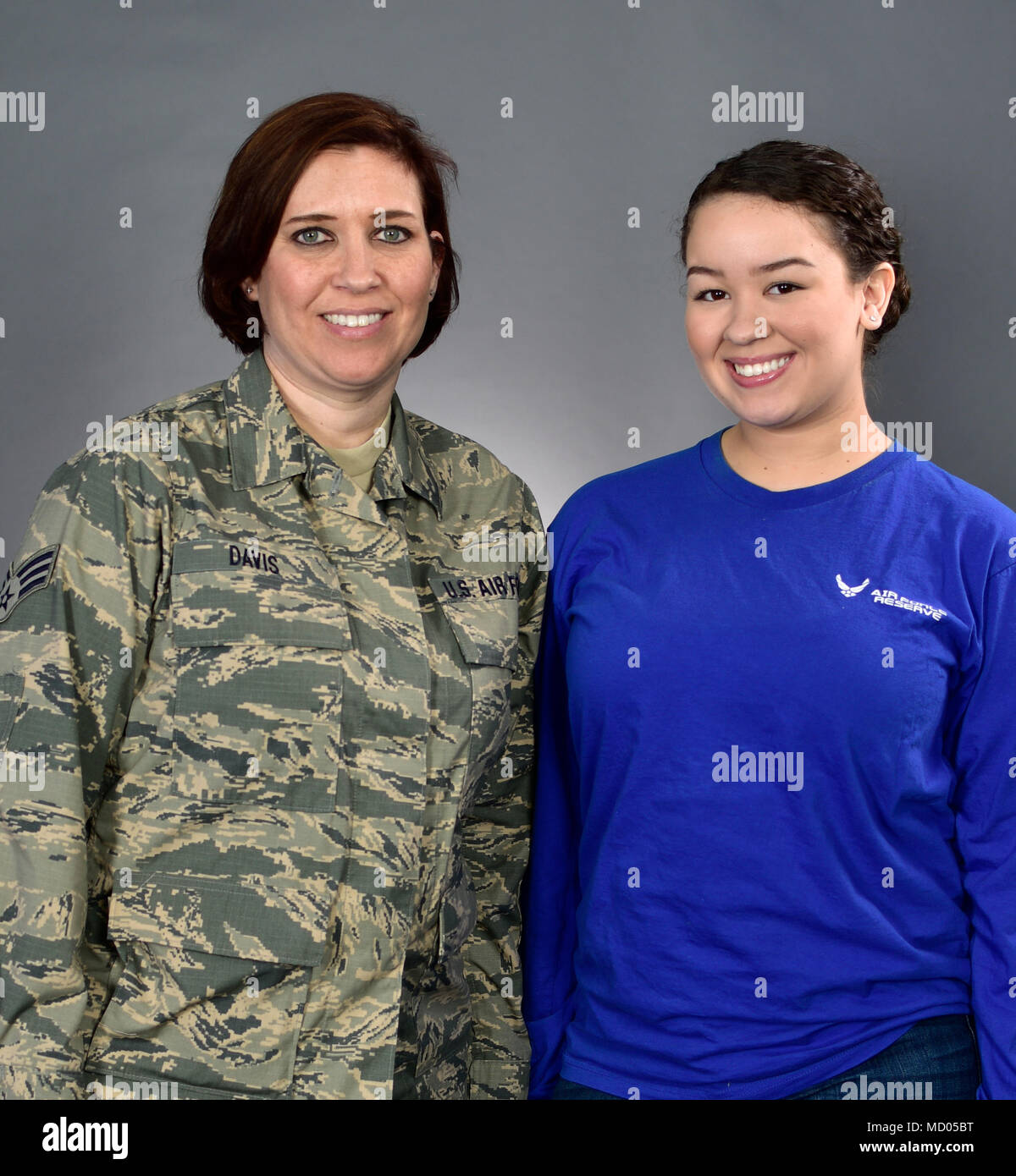 Senior Airman Kim Davis, Aerospace Medical Journeyman, 914th Aeromedical Staging Squadron, poses with daughter, Allana Depaz, March 2, 2018, Niagara Falls Air Reserve Station, N.Y. Senior Airman Davis reentered the Air Force Reserve in 2017, after a 12-year break in service. Depaz, set to depart for Basic Military Training in July, will serve under the 914th Air Refueling Wing, alongside her mother. (U.S. Air Force photo by Tech. Sgt. Steph Sawyer) Stock Photo