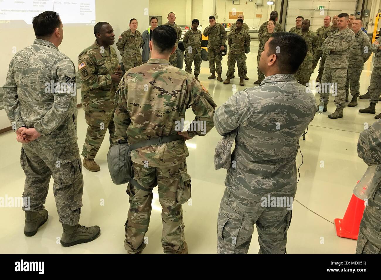 Col. U.L. Armstrong, commander of the 773rd Civil Support Team, briefs