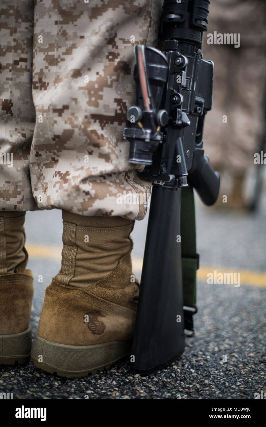 A Papa Company recruit stands at “Order Arms” during a final drill