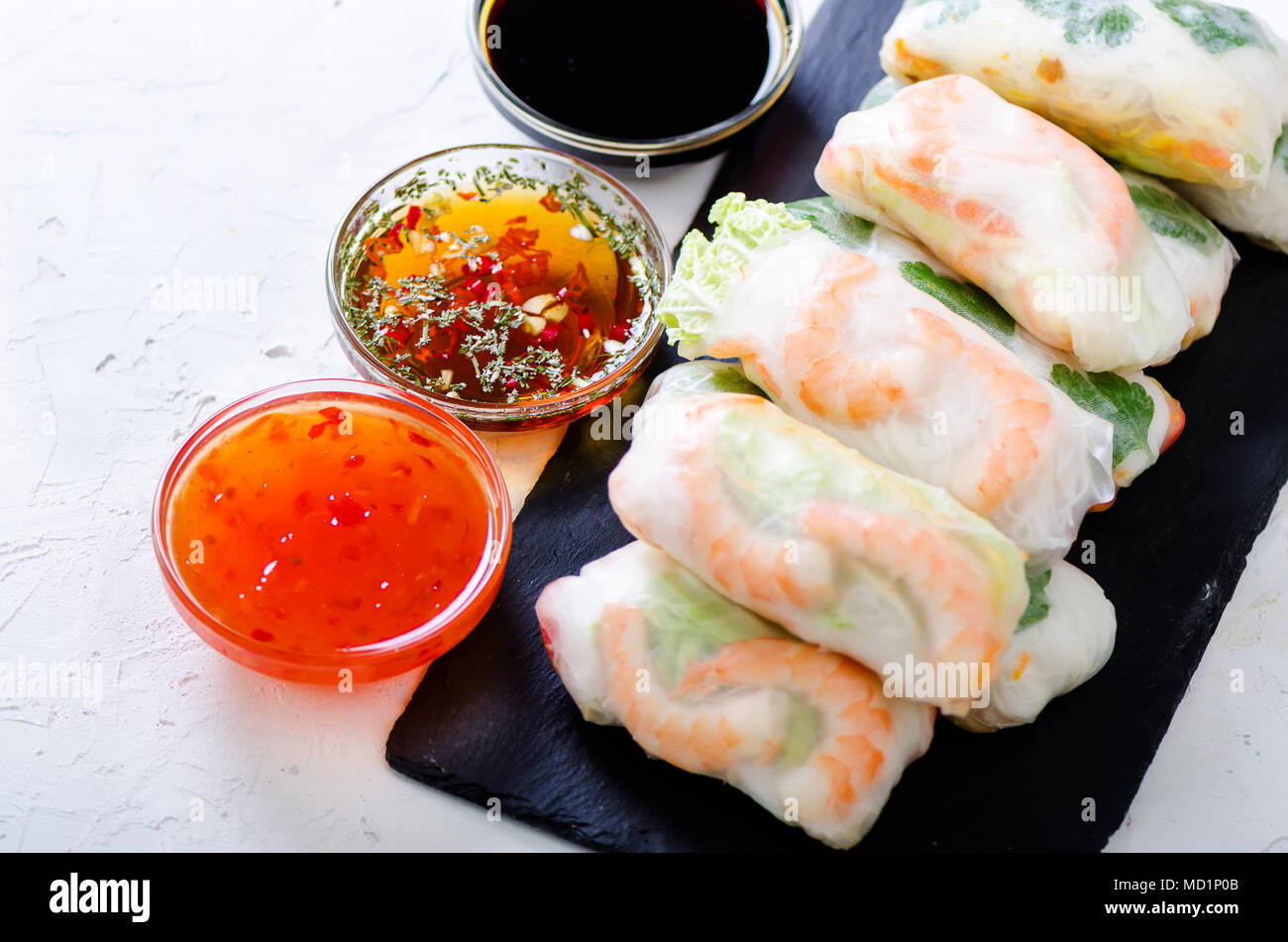 Vietnamese spring rolls - rice paper, lettuce, salad, vermicelli, noodles,  shrimps, fish sauce, sweet chili, soy, lemon, veletables Copy space Asian a  Stock Photo - Alamy