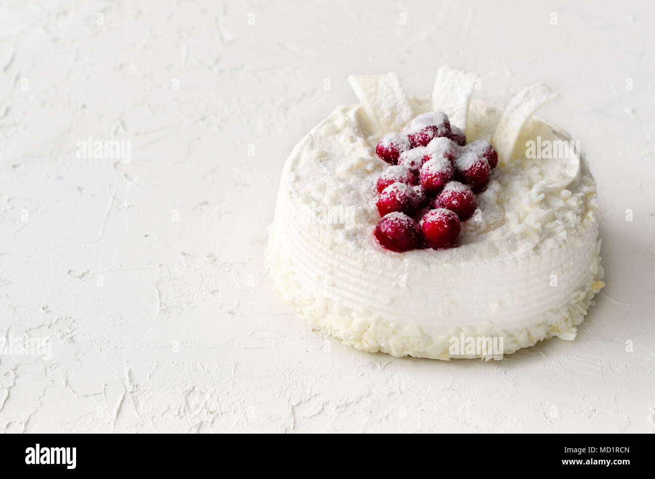 Delicious Cheesecakes With Cranberries Cherries Coconut Flakes And White Chocolate On Light Concrete Background Copyspace Stock Photo Alamy