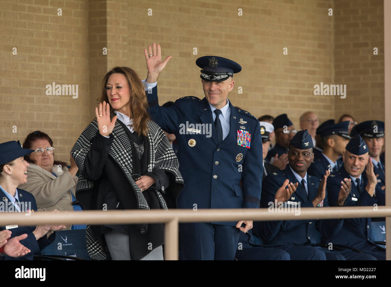 Lt. Gen. Steven L. Kwast (center), Air Education and Training Command commander attends a basic military training graduation March 9, 2018 at Joint Base San Antonio-Lackland, Texas. Approximately 35,000 trainees graduate Air Force BMT after eight and a half weeks of training. Trainees learn military discipline, Air Force core values and a comprehensive range of subjects relating to the Air Force. (Air Force photo by Ismael Ortega / Released) Stock Photo