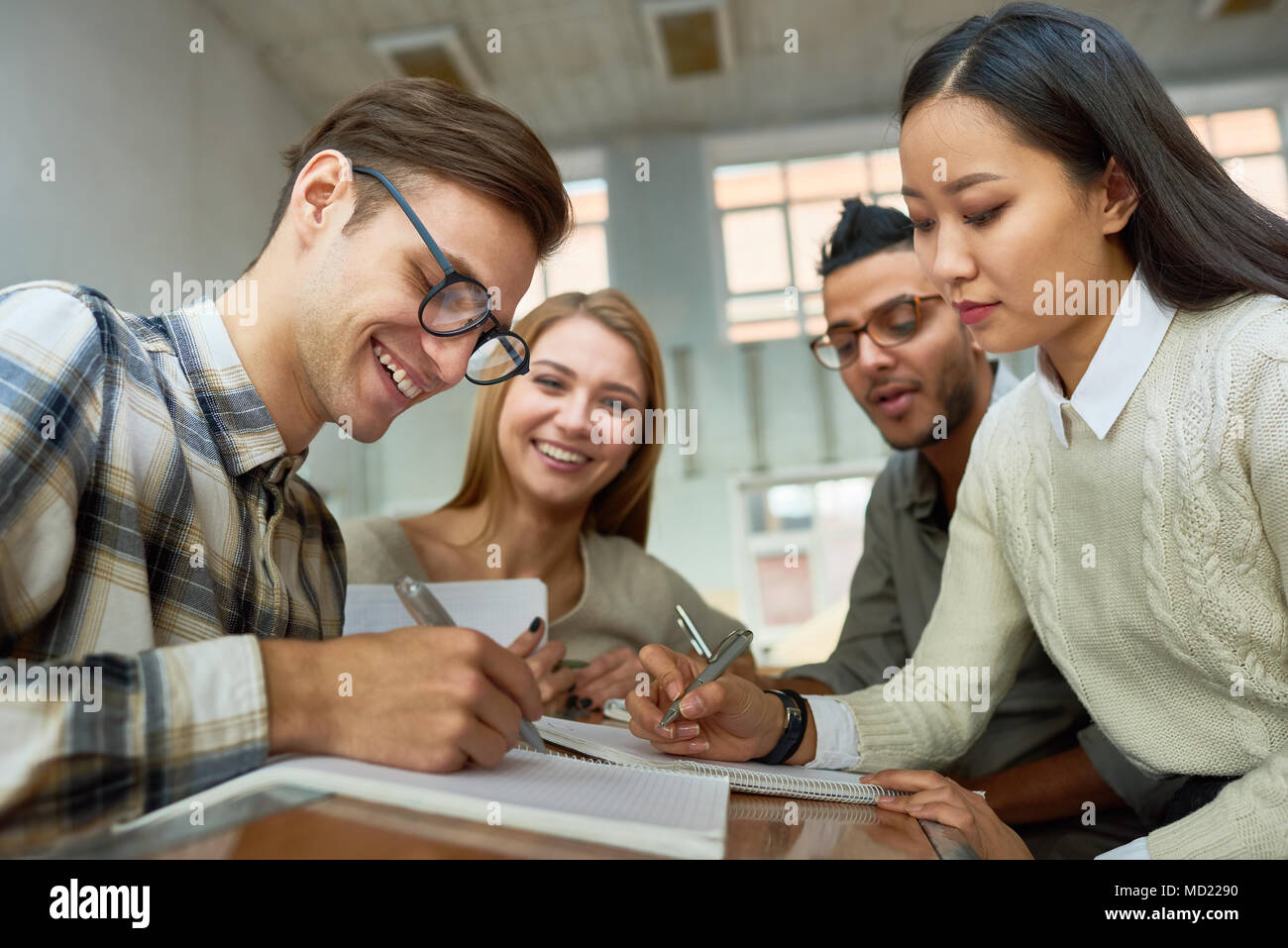 International Group of Students Collaborating Stock Photo