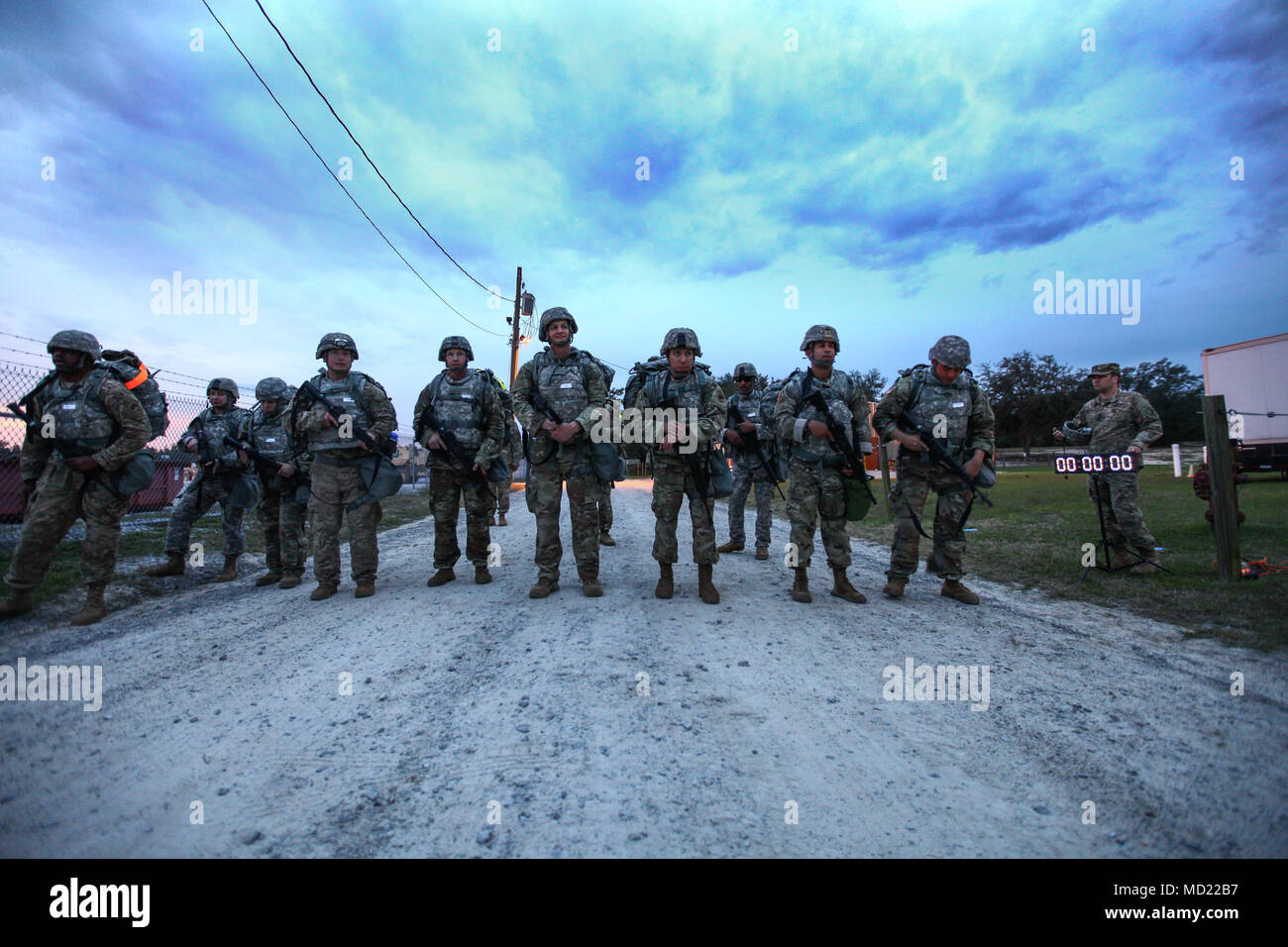 Soldiers line up before steppingoff for the 10k ruck march portion of