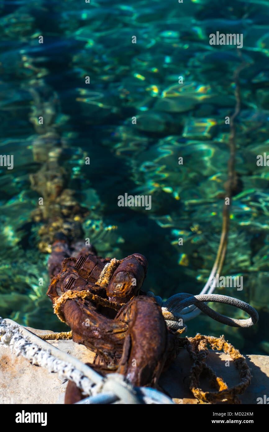 Rusty boat anchor chain Stock Photo