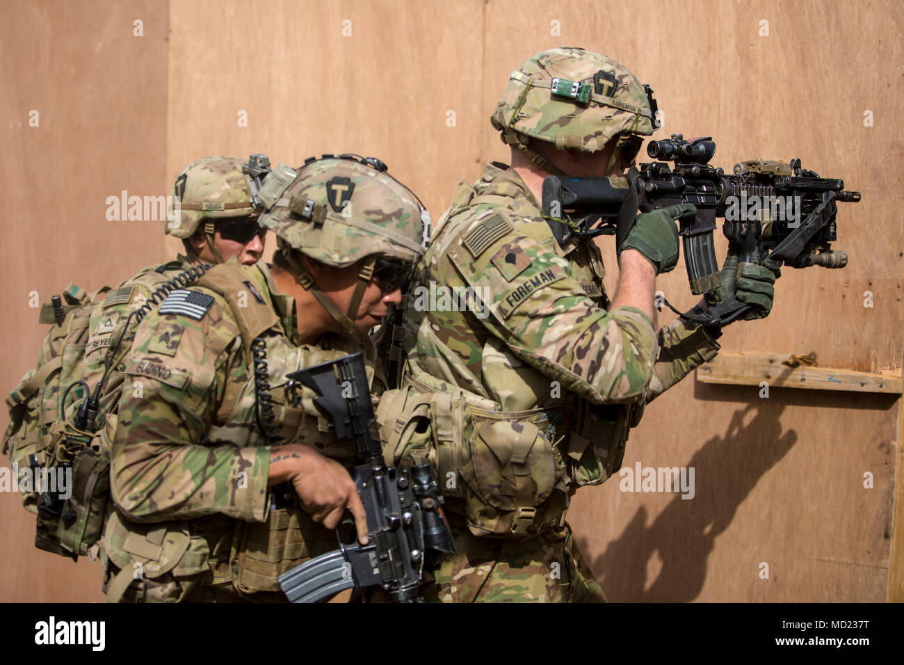 U.S. Soldiers, with 10th Mountain Division, conduct room clearing drills during a live fire readiness exercise at Camp Taji, Iraq, March 8, 2018. The 10th Mountain Division, deployed to Iraq as part of Operation Inherent Resolve, is dedicated to defeating ISIS in Iraq and restoring stability and security for the Iraqi people. (U.S. Army photo by Spc. Audrey Ward) Stock Photo