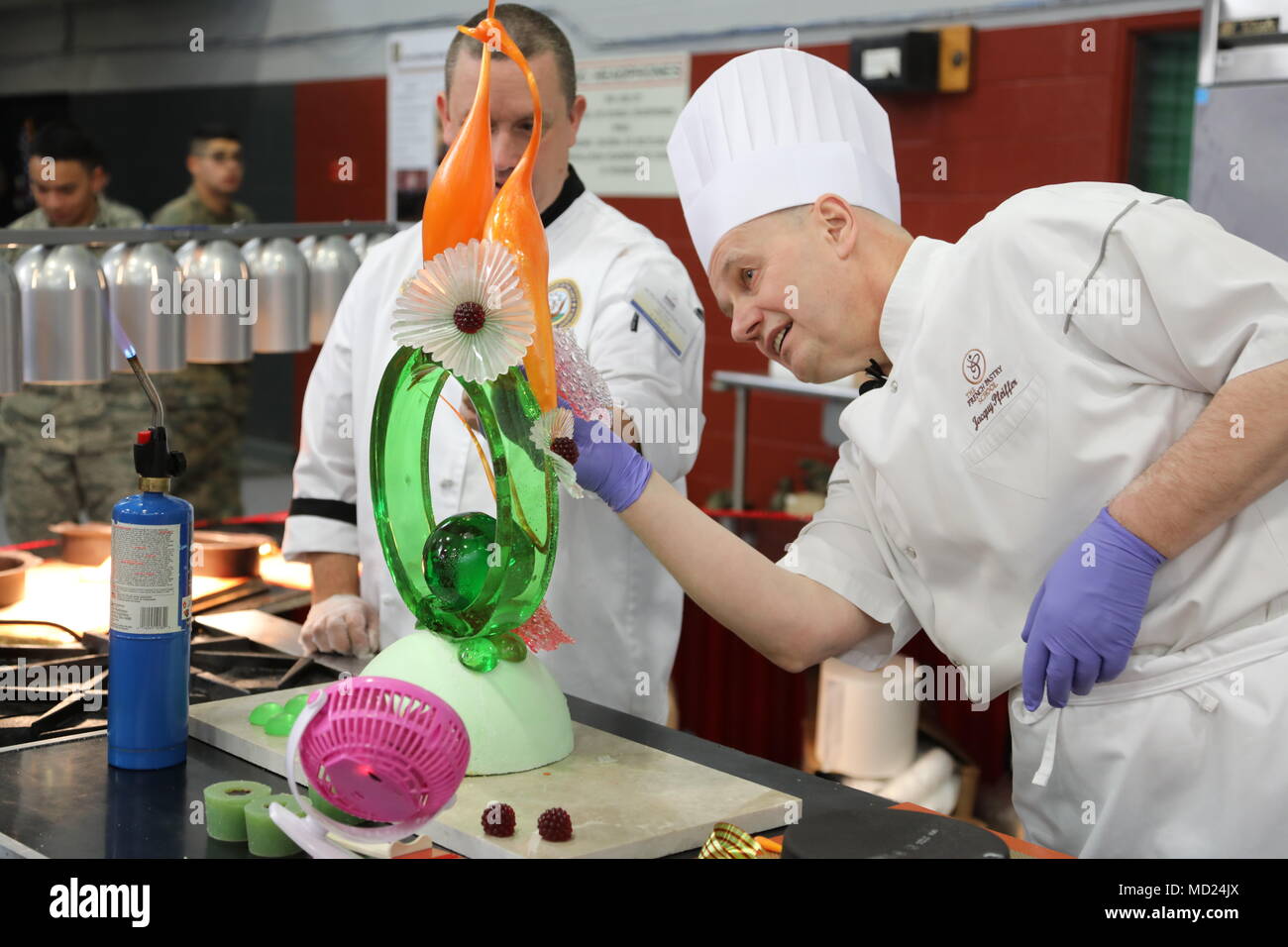 Renowned pastry chef, Jacguy Pfieffer demonstrates sugar pulling artistry  Mar. 13 at the Joint Culinary Training Exercise (JCTE), Fort Lee, Va.  During the exercise, professional chefs were given the opportunity to  highlight, image size:1300x956