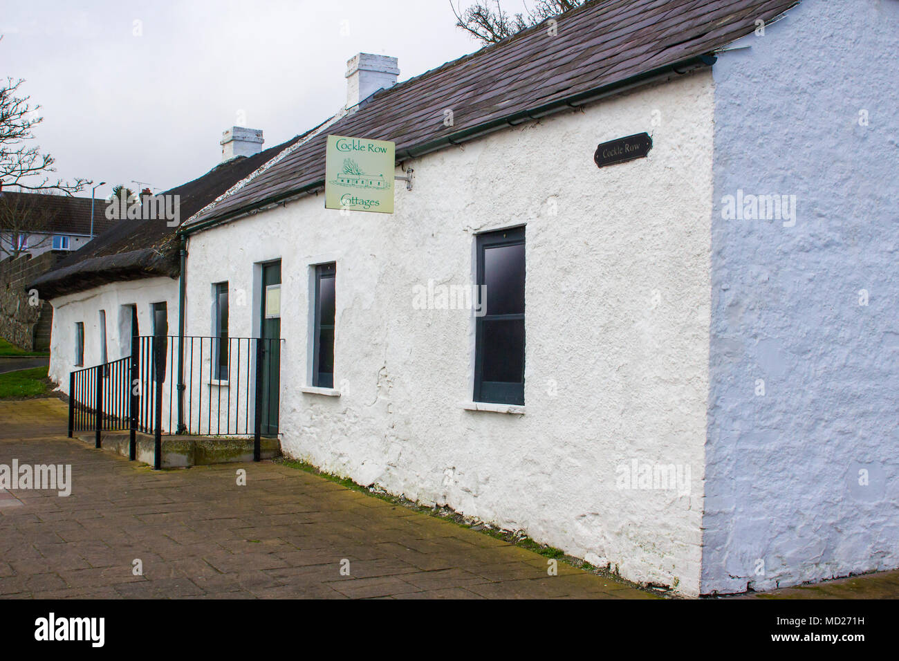 17 April 2018 The famous Irish cottages at Cockle Row in Groomsport Harbour in County Down Northern Ireland. A popular destination for visitors and to Stock Photo