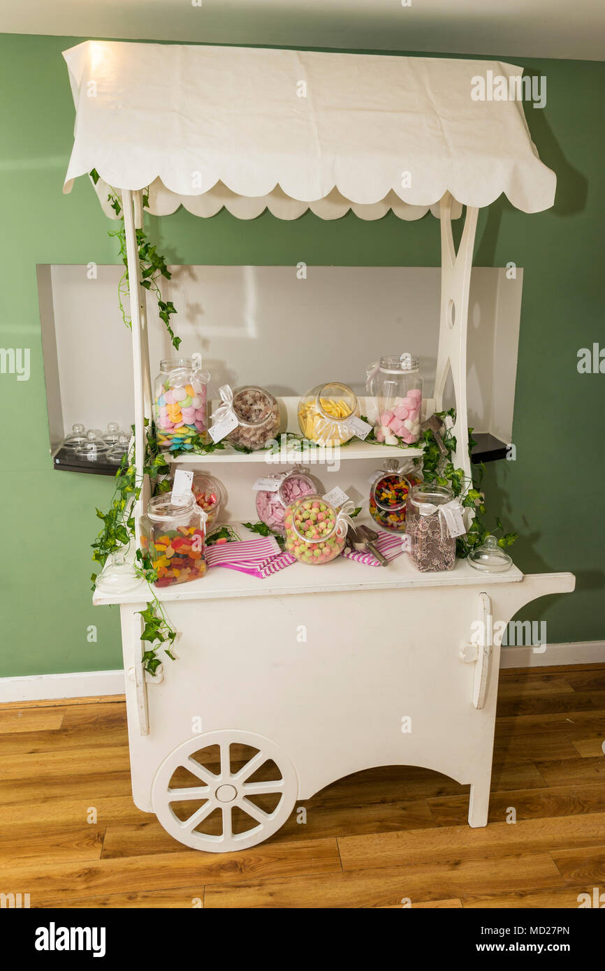 trolley loaded with confectionery at a wedding reception Stock Photo ...