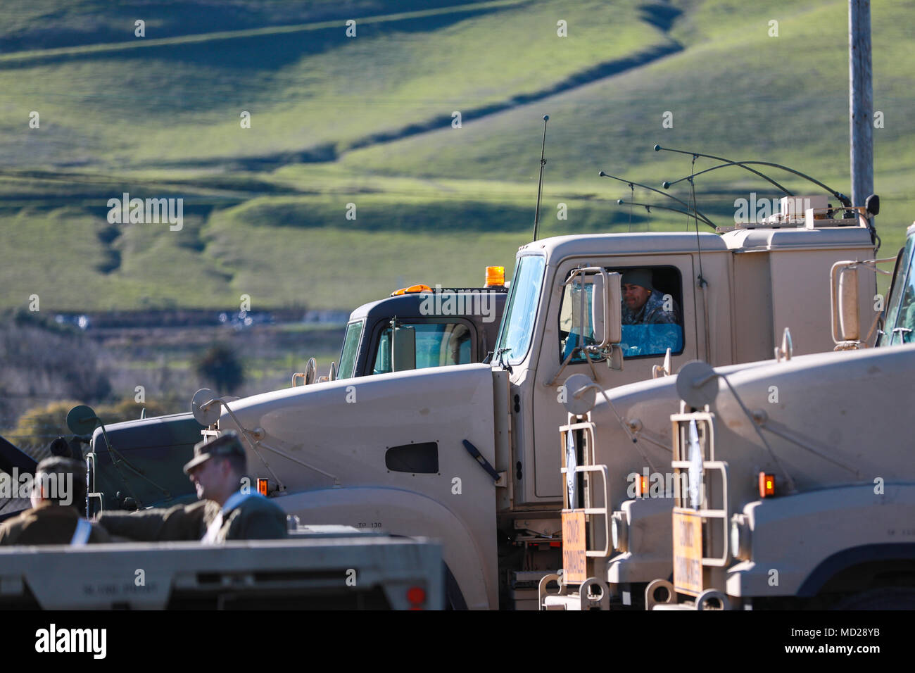 U.S. Army Reserve Soldiers prepare to conduct convoy operations during Operation Patriot Bandolier at Military Ocean Terminal Concord, California, Mar. 2, 2018. Operation Patriot Bandolier is a real-world strategic mission utilizing U.S. Army Reserve, National Guard and Active component Soldiers transport Army materiel and munitions containers across the U.S.     (U.S. Army photo by Sgt. Eben Boothby) Stock Photo