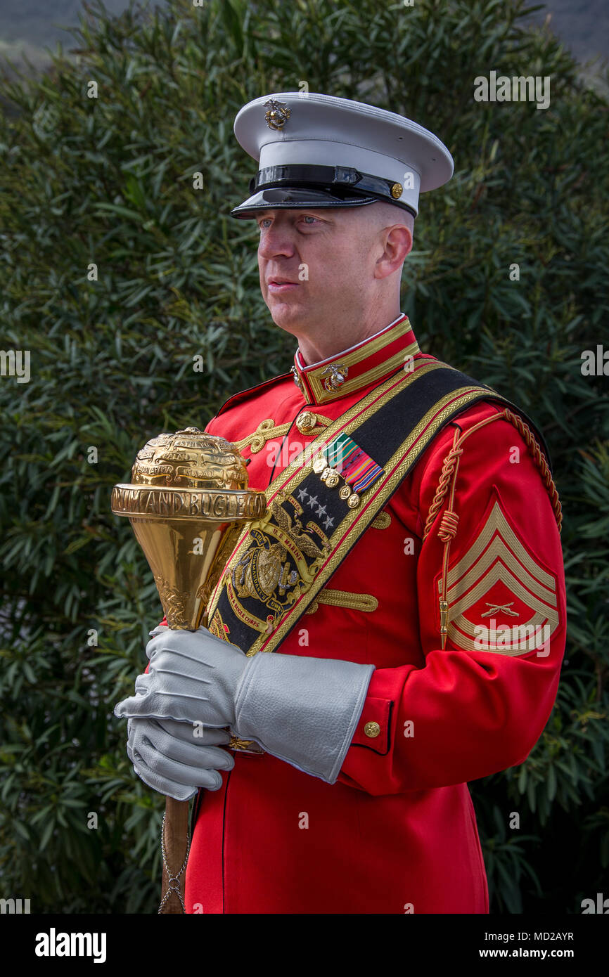U.S. Marine Corps Gunnery Sgt. Josh Dannemiller, the assistant drum major with 'The Commandant's Own,' the United States Marine Drum and Bugle Corps, Battle Color Detachment, prepares for the Battle Color ceremony at Marine Corps Base Camp Pendleton, Calif., March 15, 2018. The ceremony featured the Drum and Bugle Corps, the Silent Drill Platoon, and the Marine Corps Color Guard. (U.S. Marine Corps photo by Lance Cpl. Rhita Daniel) Stock Photo