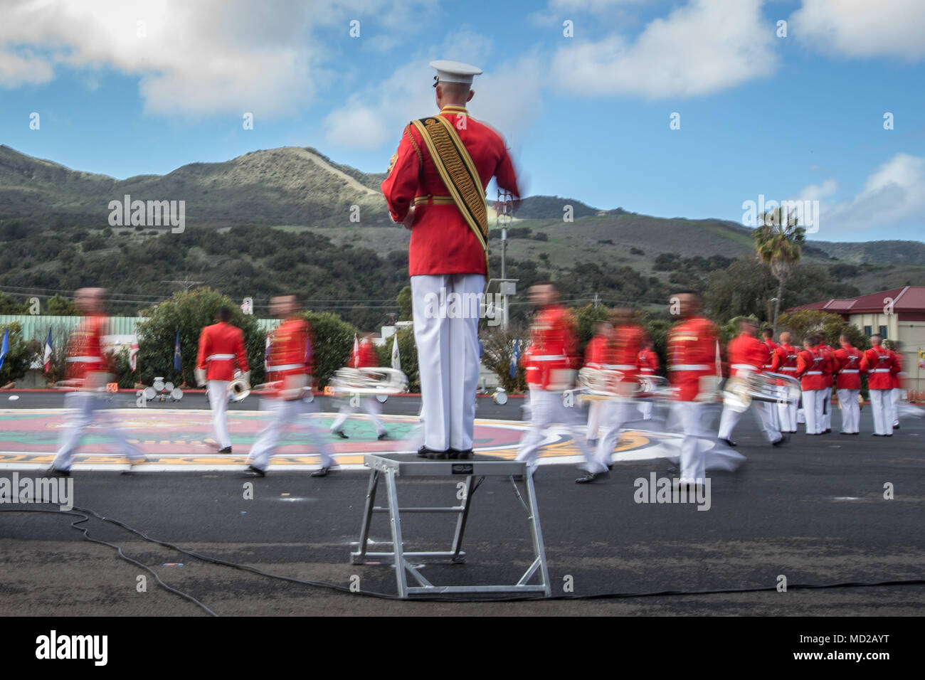 'The Commandant's Own,' the United States Marine Drum and Bugle Corps, with the Battle Color Detachment, performs during the Battle Color ceremony at Marine Corps Base Camp Pendleton, Calif., March 15, 2018. The ceremony featured the Drum and Bugle Corps, the Silent Drill Platoon, and the Marine Corps Color Guard. (U.S. Marine Corps photo by Lance Cpl. Rhita Daniel) Stock Photo