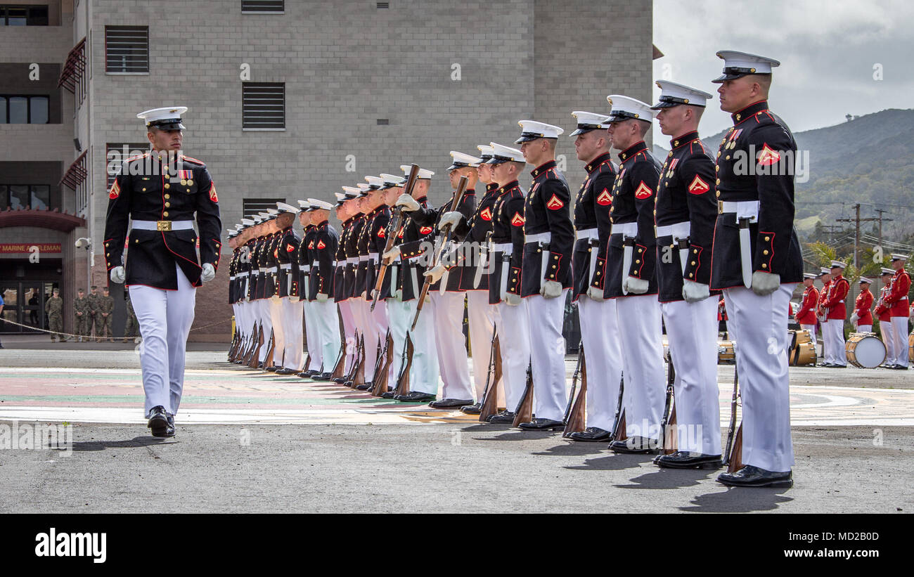 U.S. Marines with the Silent Drill Platoon with the Battle Color Detachment, perform during the Battle Color ceremony at Marine Corps Base Camp Pendleton, Calif., March 15, 2018. The ceremony featured the platoon, 'The Commandant's Own,' the United States Marine Drum and Bugle Corps and the Marine Corps Color Guard. (U.S. Marine Corps photo by Lance Cpl. Rhita Daniel) Stock Photo