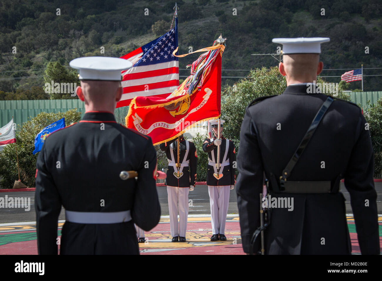 The U.S. Marine Corps Color Guard Platoon, with the Battle Color Detachment, presents the American and Marine Corps Battle Color flags during the Battle Colors Ceremony at Marine Corps Base Camp Pendleton, Calif., March 15, 2018. The ceremony featured the color guard, the Silent Drill Platoon, and 'The Commandant's Own,' the United States Marine Drum and Bugle Corps. (U.S. Marine Corps photo by Lance Cpl. Rhita Daniel) Stock Photo