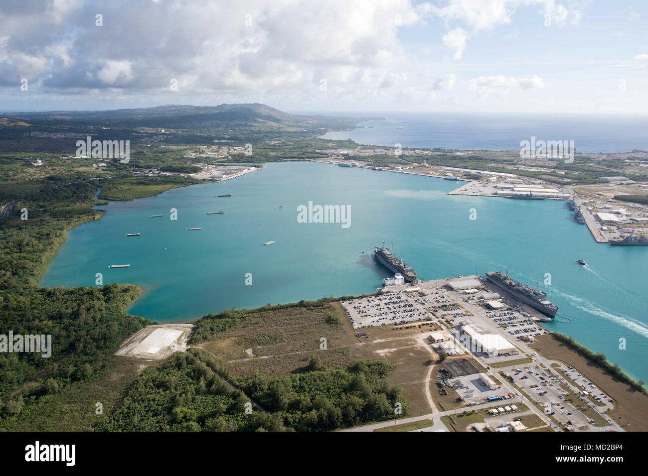 An aerial view of U.S. Naval Base Guam shows several Navy vessels