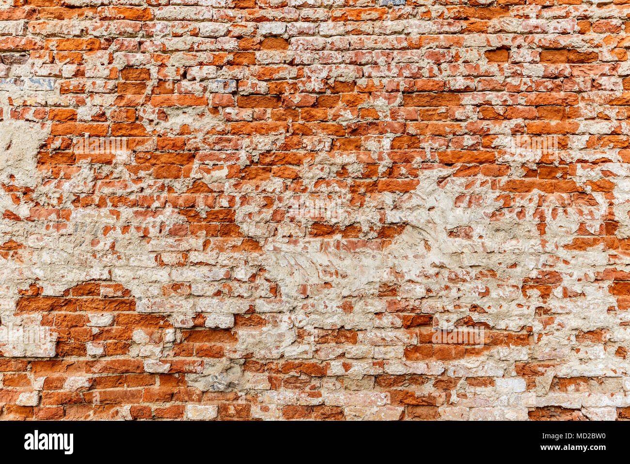 Old brick wall with white and red bricks background. Stock Photo