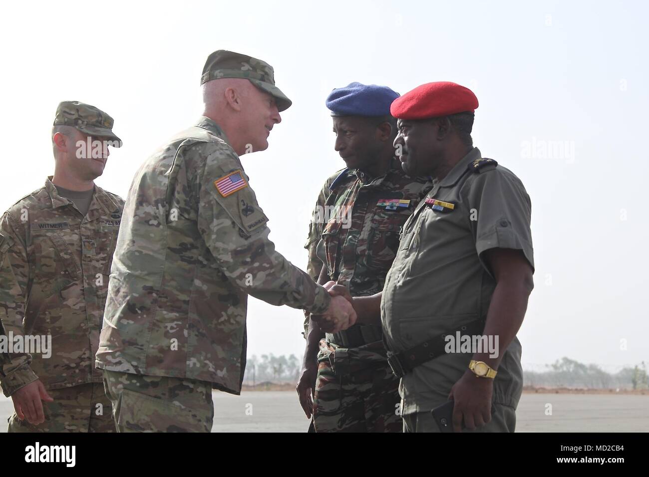 Brig. Gen. Eugene J. LeBoeuf, acting commanding general for U.S. Army Africa, visits Task Force Darby at Contingency Location Garoua, Cameroon March 15, 2018. Upon arrival, LeBoeuf shakes hands with Brigadier General Ekonguese of the Cameroonian Military on his way to the Garoua Regional Hospital for a USARAF medical exercise. TF Darby serve members at CL Garoua, are serving in a support role for the Cameroonian Military’s fight against the violent extremist organization Boko Haram. Stock Photo