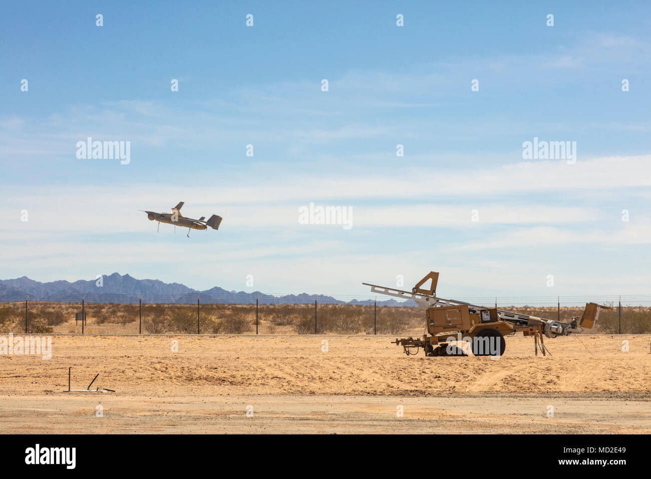 U.S. Marines with Marine Unmanned Aerial Vehicle Squadron (VMU) 1 launch an RQ-21 Blackjack in support of Weapons and Tactics Instructor course 2-18 at Cannon Air Defense Complex, Yuma, Ariz., March 22. WTI is a seven-week training event hosted by MAWTS-1 cadre, which emphasizes operational integration of the six functions of Marine Corps aviation in support of a Marine Air Ground Task Force and provides standardized advanced tactical training and certification of unit instructor qualifications to support Marine Aviation Training and Readiness and assists in developing and employing aviation w Stock Photo